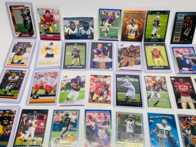 Photo 2 of 45 football trading cards in plastic sleeves 