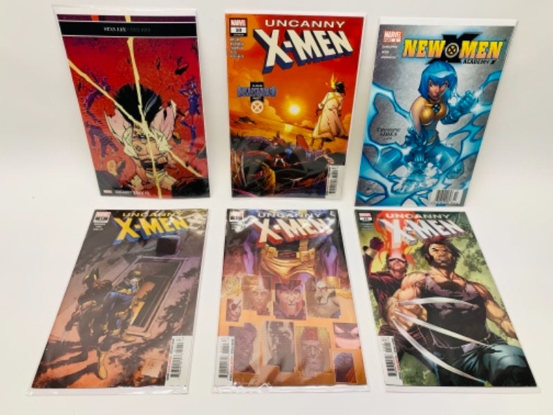 Photo 1 of 6 X-men comics in plastic sleeves 