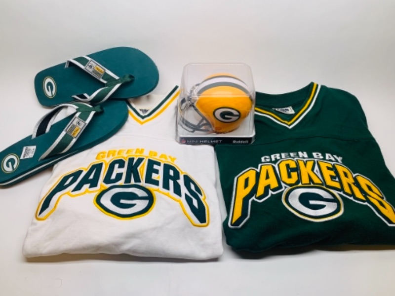 Photo 1 of 2 used long sleeve packers shirts size xxl, flip flops, and mini helmet- shirts need a cleaning 