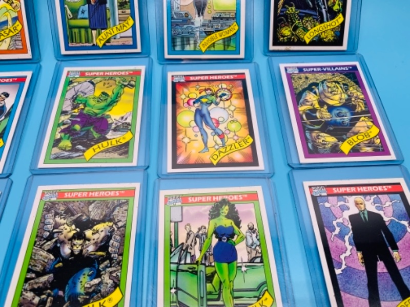 Photo 3 of 12 vintage 1990 Marvel super heroes  and super villains cards in plastic sleeves