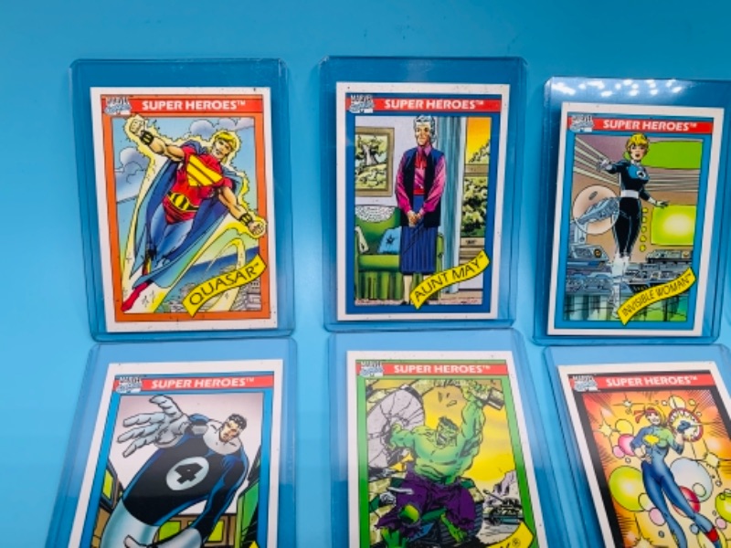 Photo 4 of 12 vintage 1990 Marvel super heroes  and super villains cards in plastic sleeves