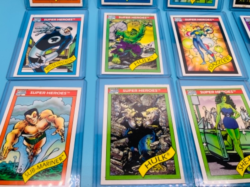 Photo 2 of 12 vintage 1990 Marvel super heroes  and super villains cards in plastic sleeves