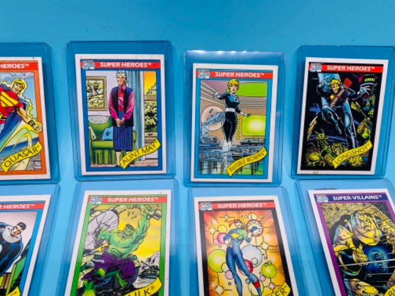 Photo 5 of 12 vintage 1990 Marvel super heroes  and super villains cards in plastic sleeves