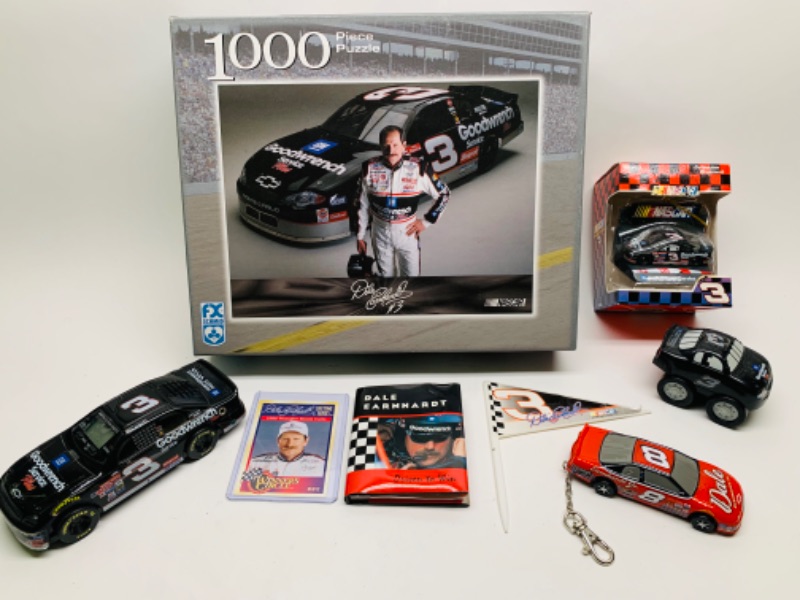 Photo 1 of Dale Earnhardt collectibles- car radio, puzzle, keychain, mini book and more 