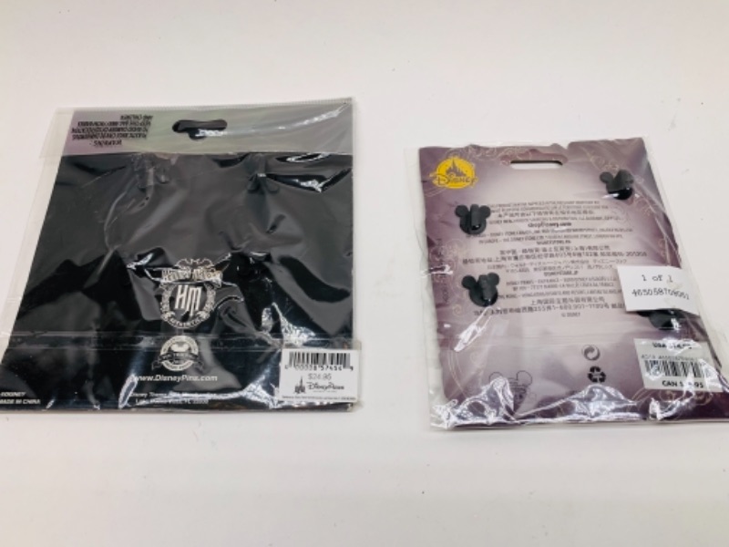 Photo 3 of Disney haunted mansion and ensemble pin  sets in packages