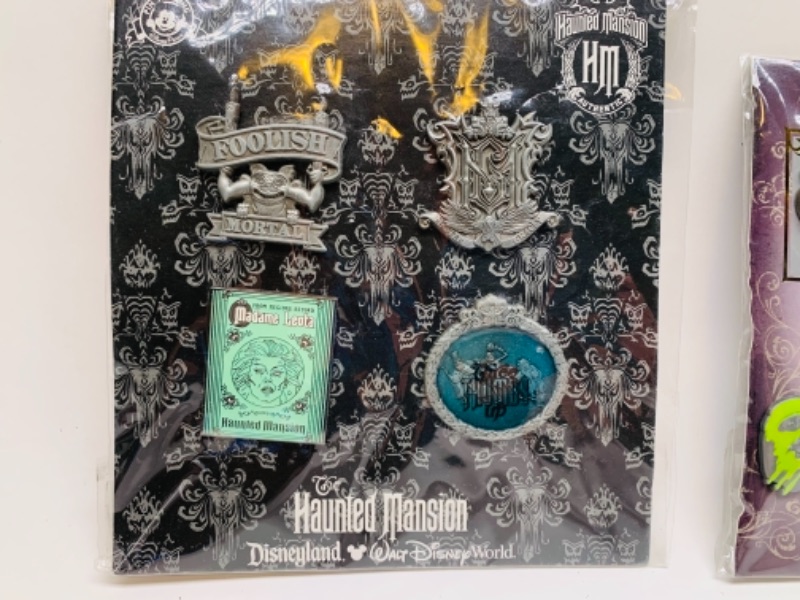 Photo 4 of Disney haunted mansion and ensemble pin  sets in packages