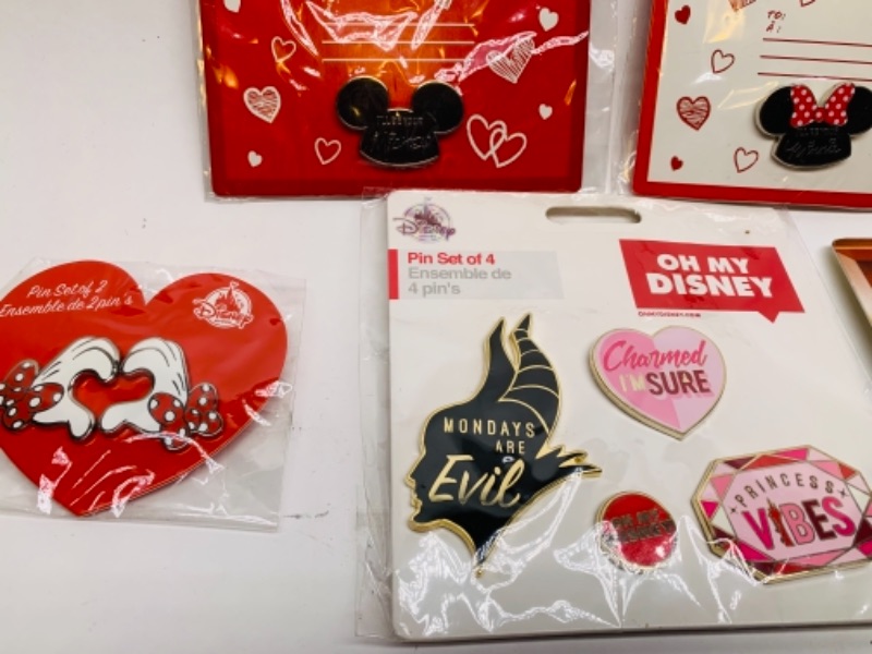 Photo 3 of 5 Disney pin sets in packages 