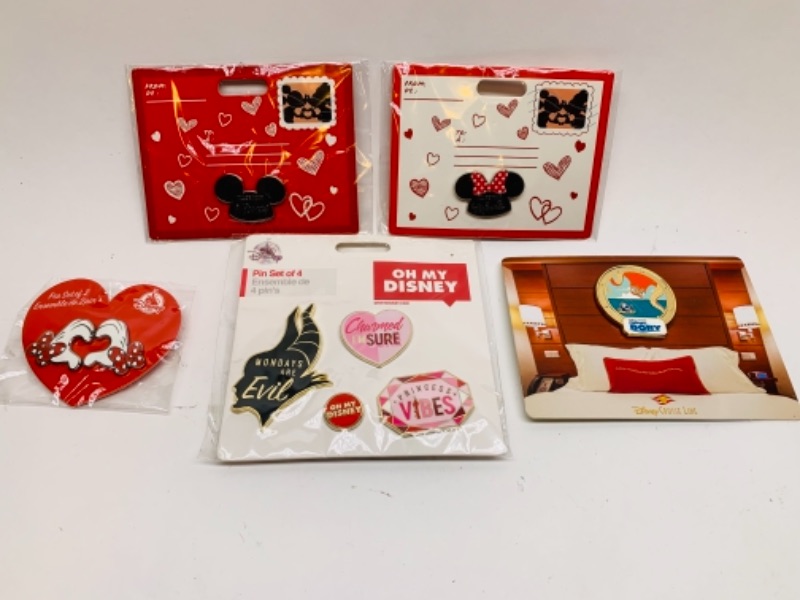 Photo 1 of 5 Disney pin sets in packages 