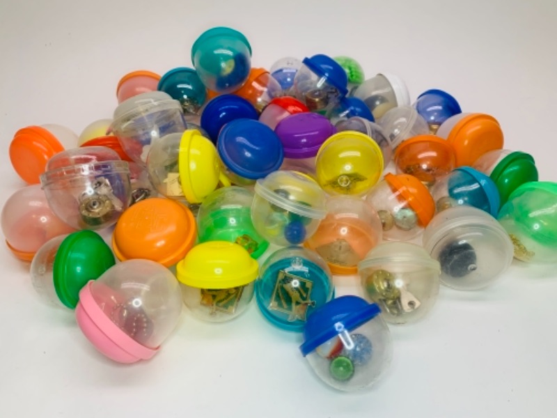 Photo 1 of 50 misc toys in plastic containers 