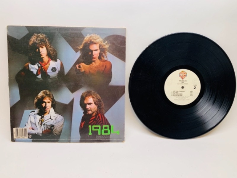 Photo 3 of 1983 Van Halen 1984 vinyl 33 rpm record in plastic sleeve cover and record in great condition for age 