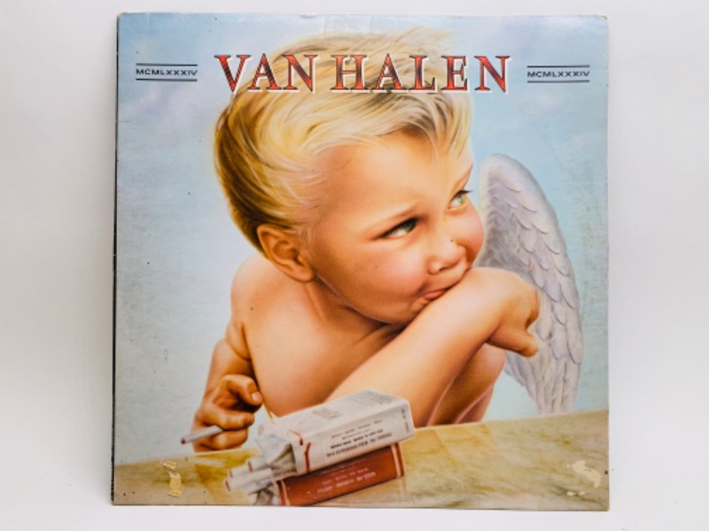 Photo 2 of 1983 Van Halen 1984 vinyl 33 rpm record in plastic sleeve cover and record in great condition for age 