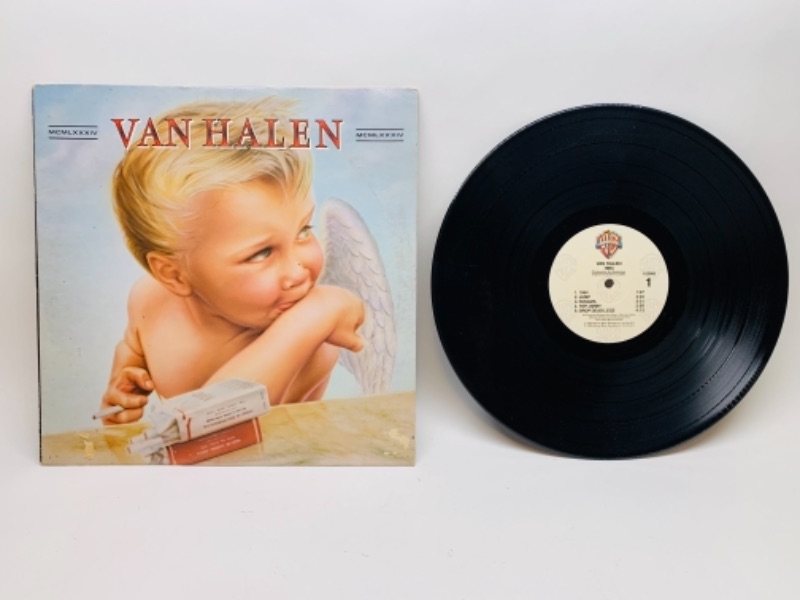 Photo 1 of 1983 Van Halen 1984 vinyl 33 rpm record in plastic sleeve cover and record in great condition for age 