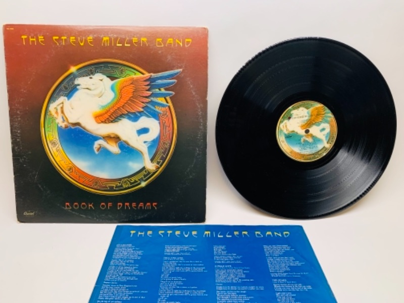 Photo 1 of 1977 Steve Miller band door of dreams vinyl 33 rpm record in plastic sleeve cover and record in great condition for age 