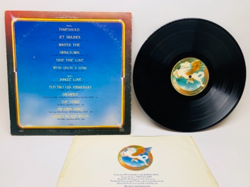 Photo 2 of 1977 Steve Miller band door of dreams vinyl 33 rpm record in plastic sleeve cover and record in great condition for age 