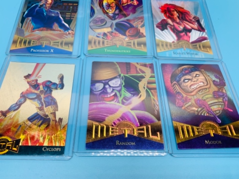 Photo 2 of 1995 Marvel metal trading cards in  hard plastic sleeves