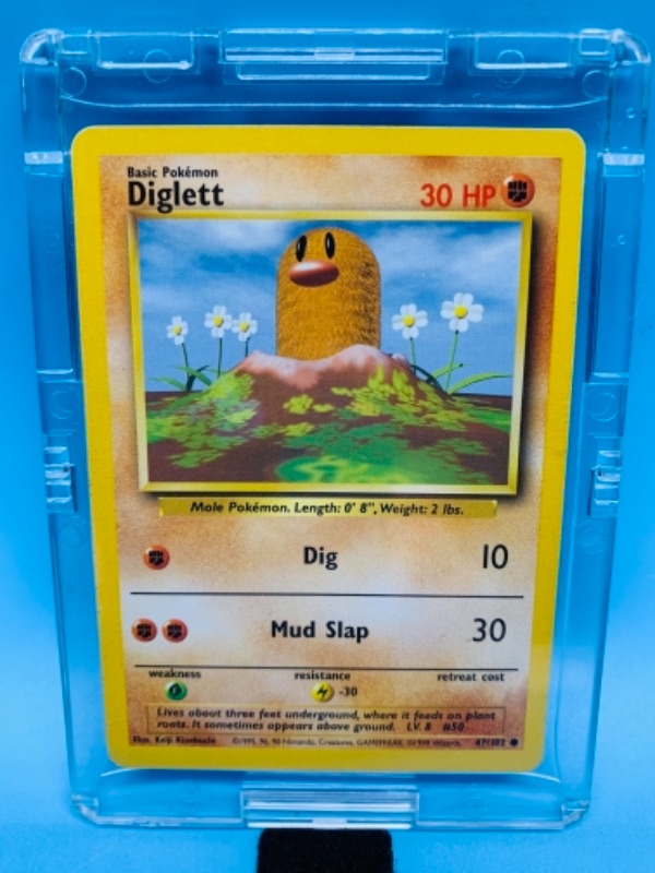 Photo 1 of Pokémon diglett basic 47/102 card in hard plastic case 