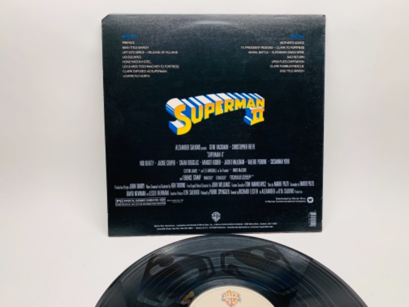 Photo 3 of Superman II original soundtrack vinyl 33 rpm record in plastic sleeve album cover and record in great condition for age 