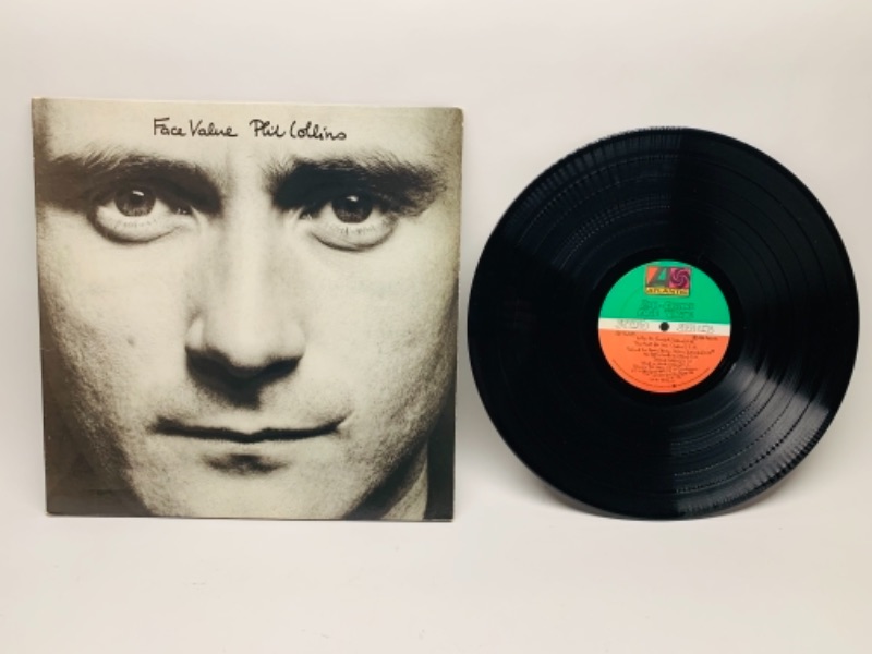 Photo 1 of 1981 Phil Collins face value vinyl 33  RPM record in plastic sleeve cover and record in great condition for age 