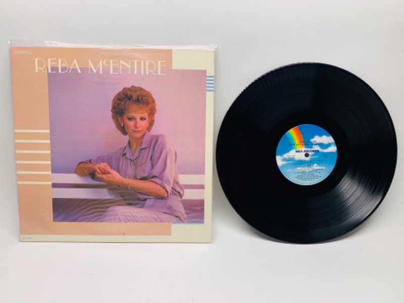 Photo 1 of 1986 reba McEntire what am I gonna do about you vinyl 33 RPM record in plastic sleeve cover and record in great condition for age 