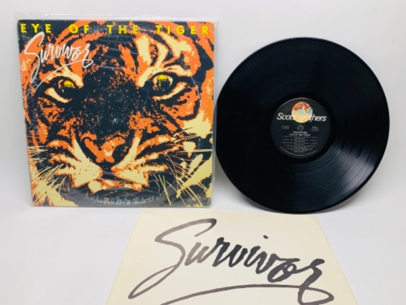 Photo 1 of 1982 Survivor I of the Tiger vinyl 33  RPM record in plastic sleeve cover and record in great condition for age 