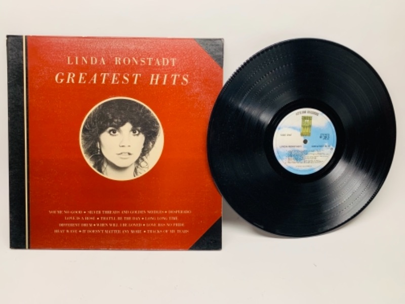 Photo 1 of 1976 Linda Ronstadt greatest hits vinyl 33 rpm record in plastic sleeve cover and record in great condition for age 