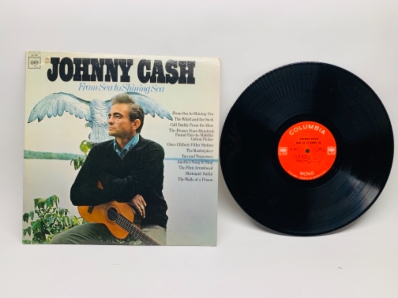 Photo 1 of 766330…Johnny Cash from sea to shining sea vinyl 33 RPM record in plastic sleeve cover and record in great condition for age 