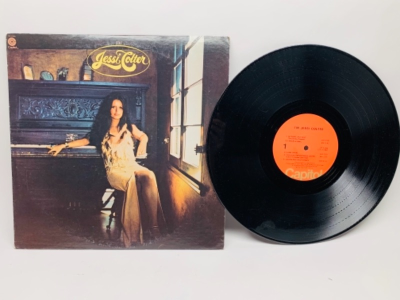 Photo 1 of 1975 jessi colter vinyl 33 rpm record in plastic sleeve cover and record in great condition for age 
