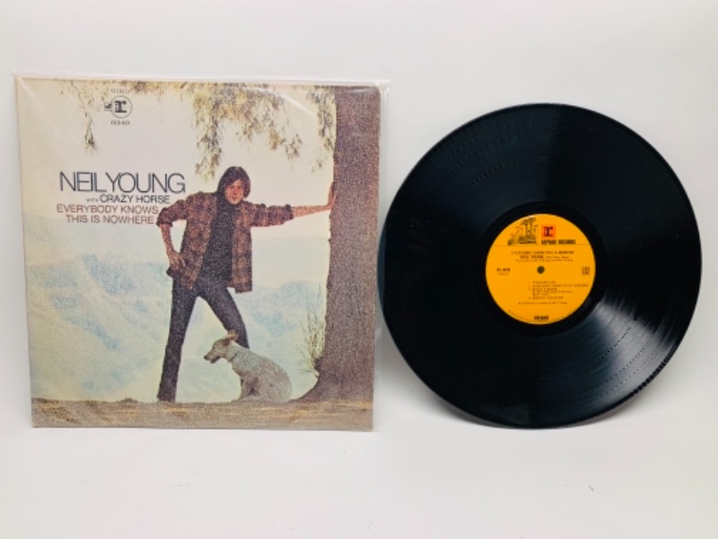 Photo 1 of Neil young with Crazyhorse vinyl 33 rpm record in plastic sleeve cover and record in great condition for age 