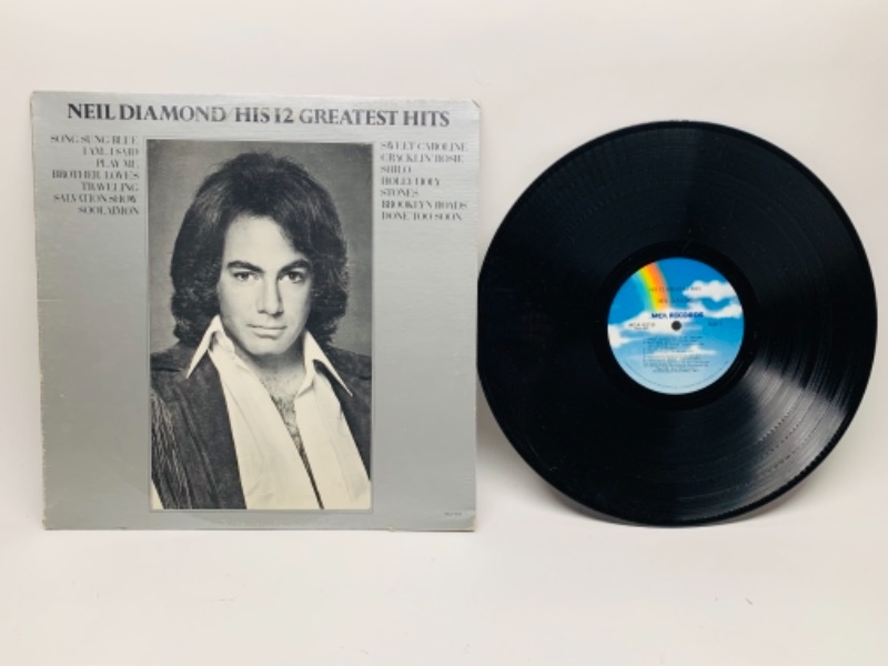 Photo 1 of 1974 Neil diamond greatest hits vinyl 33 rpm record in plastic sleeve cover and record in great condition for age 