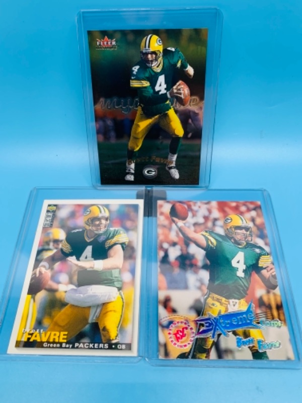 Photo 1 of Brett favre trading cards in hard plastic sleeves 