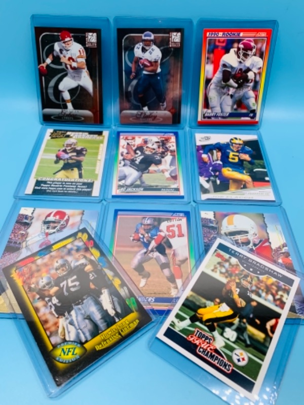 Photo 1 of 11 football trading cards in hard plastic sleeves 