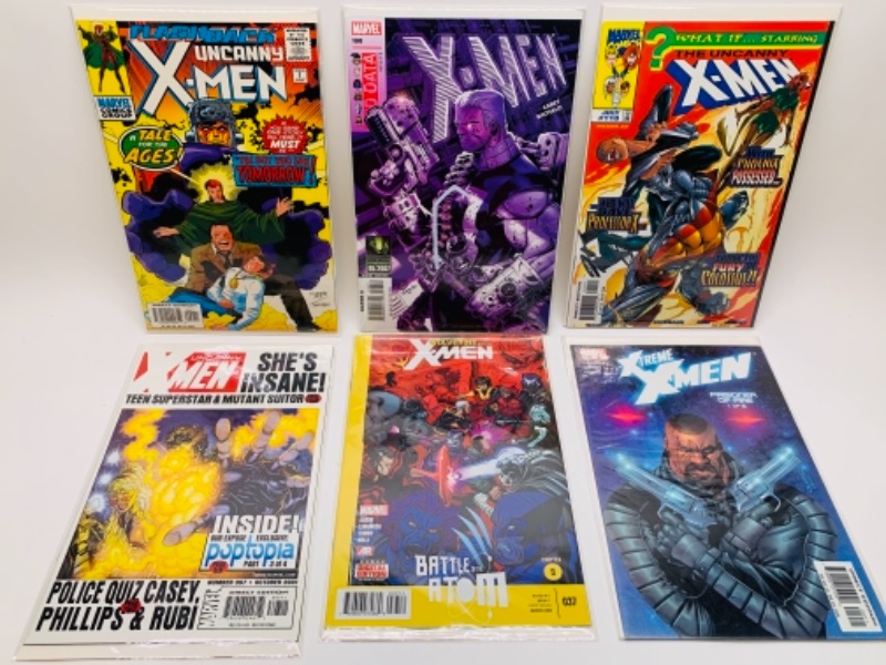 Photo 1 of 383… six X-Men comics in plastic sleeves