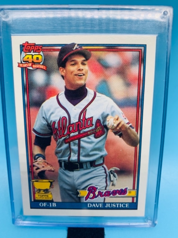 Photo 1 of 766434…topps 1991 Dave justice card 329 in hard plastic case 