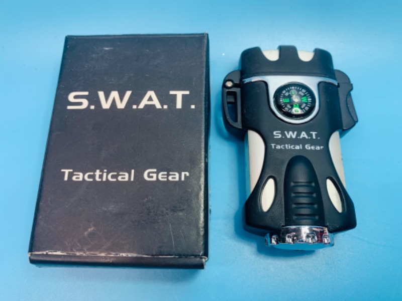 Photo 1 of 480…swat tactical gear lighter in box