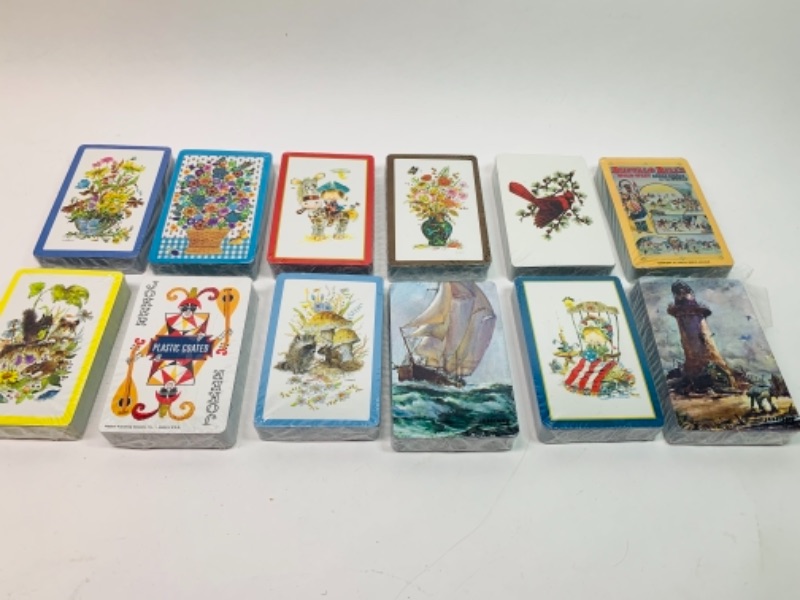 Photo 1 of 766487…12 sealed vintage bridge size playing card decks