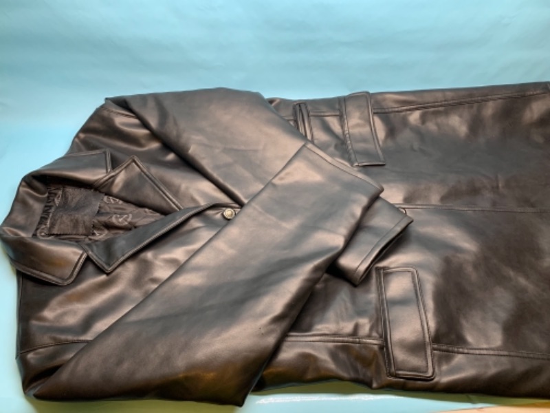 Photo 1 of 766585…men’s size xxl leather look jacket - one small tear in back of arm