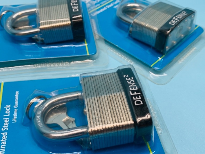 Photo 1 of 766588…three 1 3/4 inch steel locks with keys 