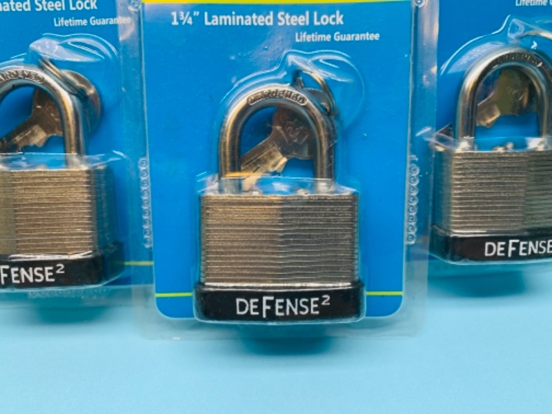 Photo 2 of 766588…three 1 3/4 inch steel locks with keys 
