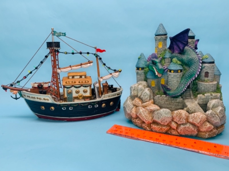 Photo 1 of 766675…dragon fountain and ship figure both need batteries and battery doors 