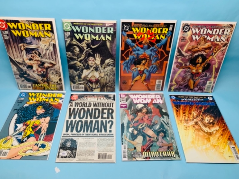 Photo 1 of 766691… 8 Wonder Woman comics in plastic sleeves 