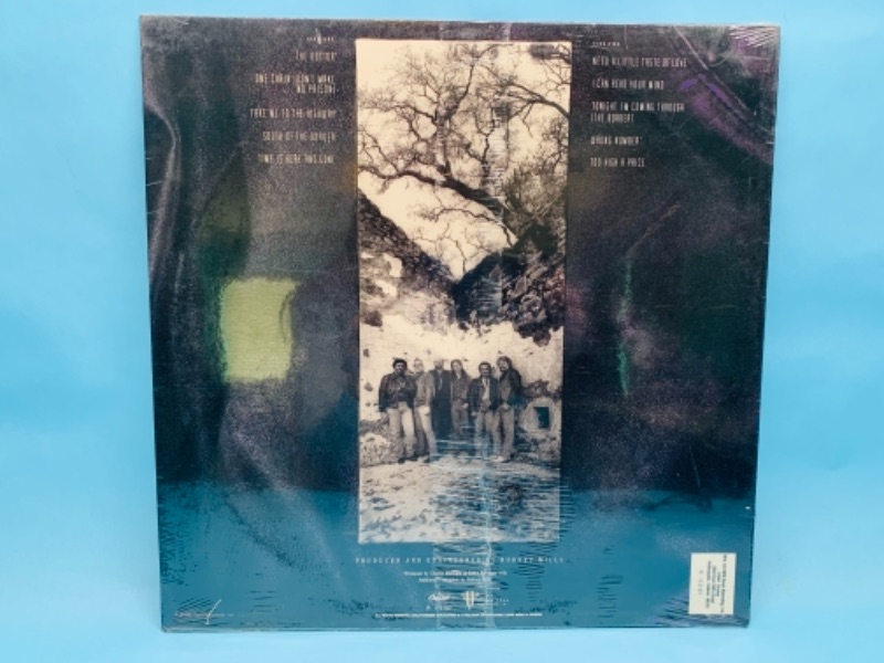 Photo 3 of 766748…sealed 1989 doobie brothers vinyl great condition in plastic sleeve 