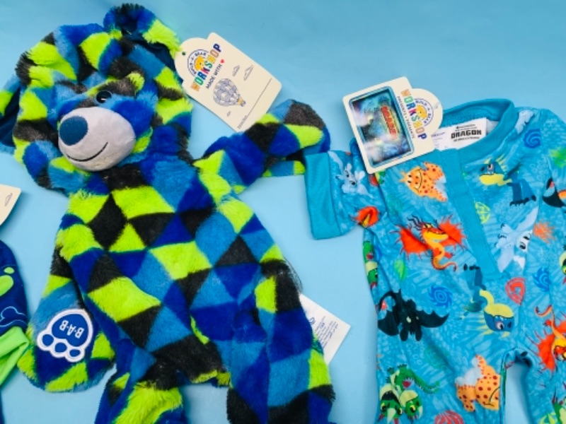 Photo 2 of 766790…unstuffed build a bear and two outfits with tags