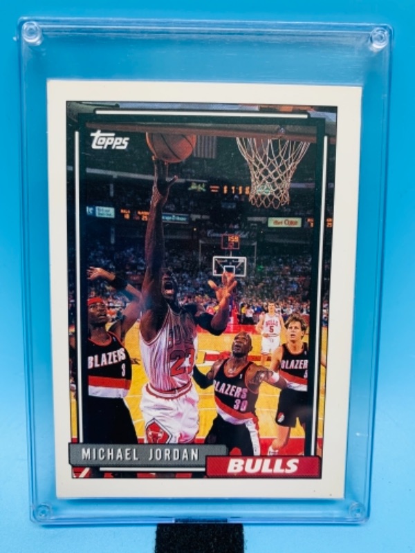 Photo 1 of 766823…topps 1992 Michael Jordan card 141 in  hard plastic case