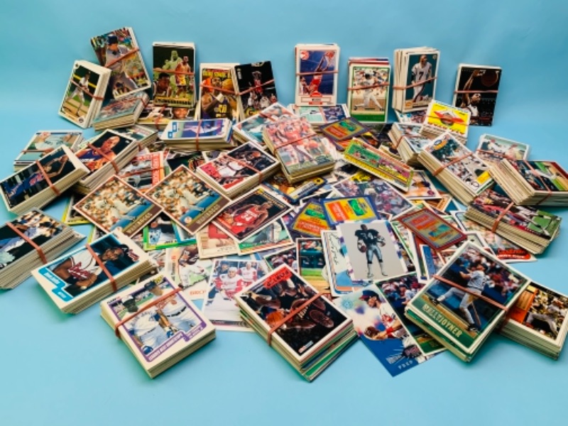 Photo 1 of 766833…over 1800 mixed and unsorted  sports trading cards 