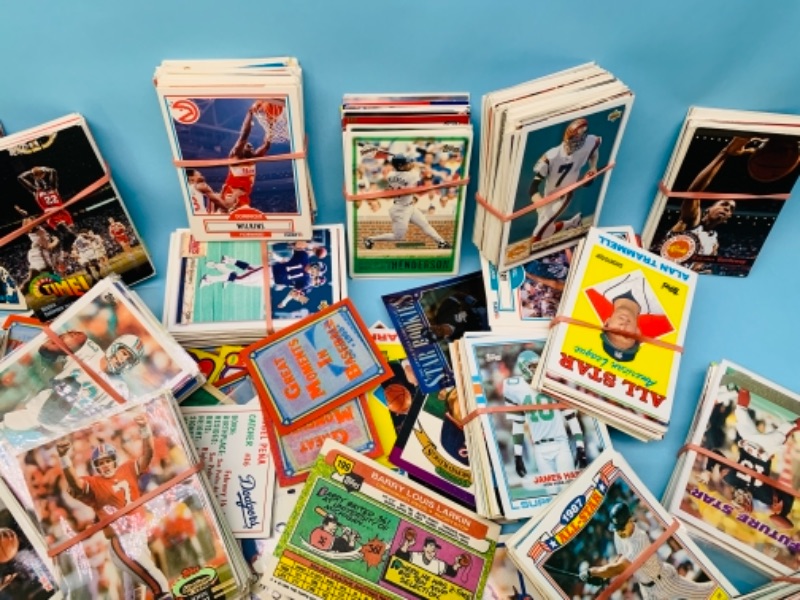 Photo 4 of 766833…over 1800 mixed and unsorted  sports trading cards 