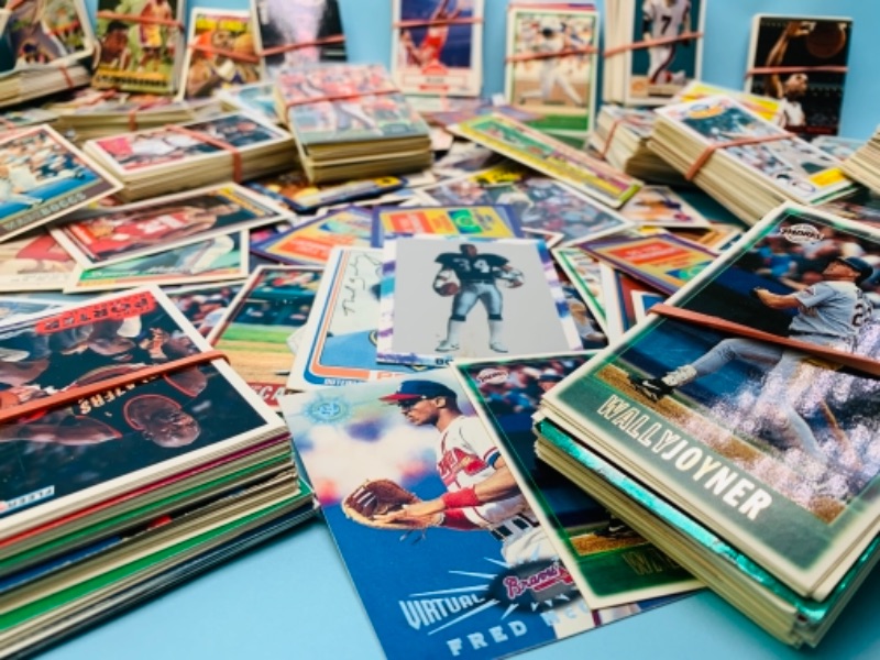 Photo 5 of 766833…over 1800 mixed and unsorted  sports trading cards 