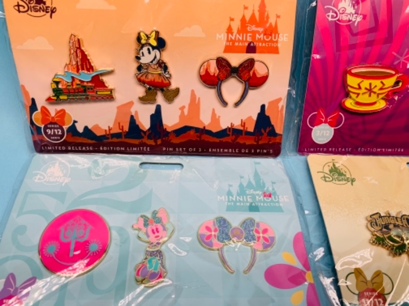 Photo 2 of 766857…4 sets Disney limited release pins in packages 12 pins total 