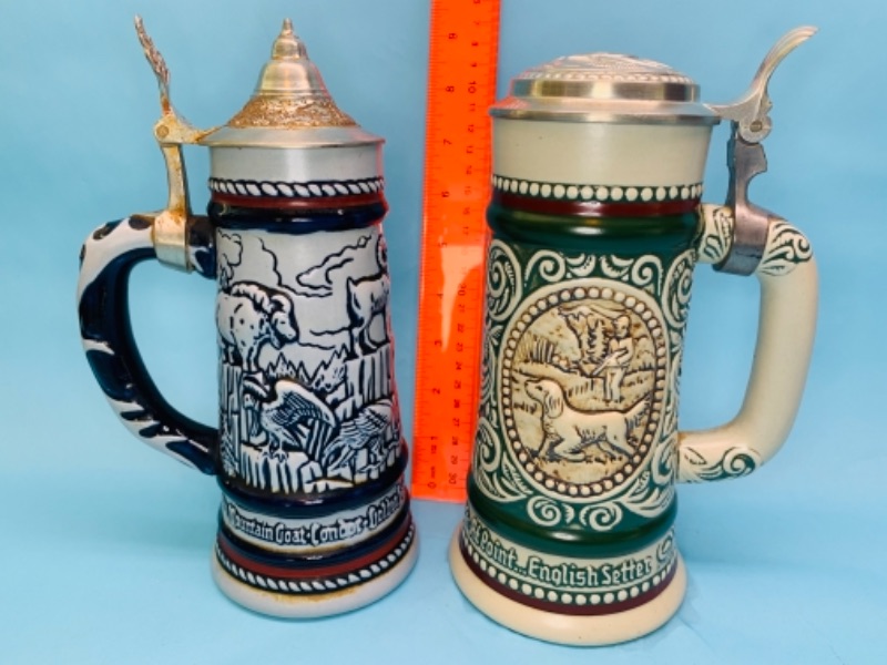 Photo 2 of 766873…two 9 inch animal steins handcrafted in Brazil 