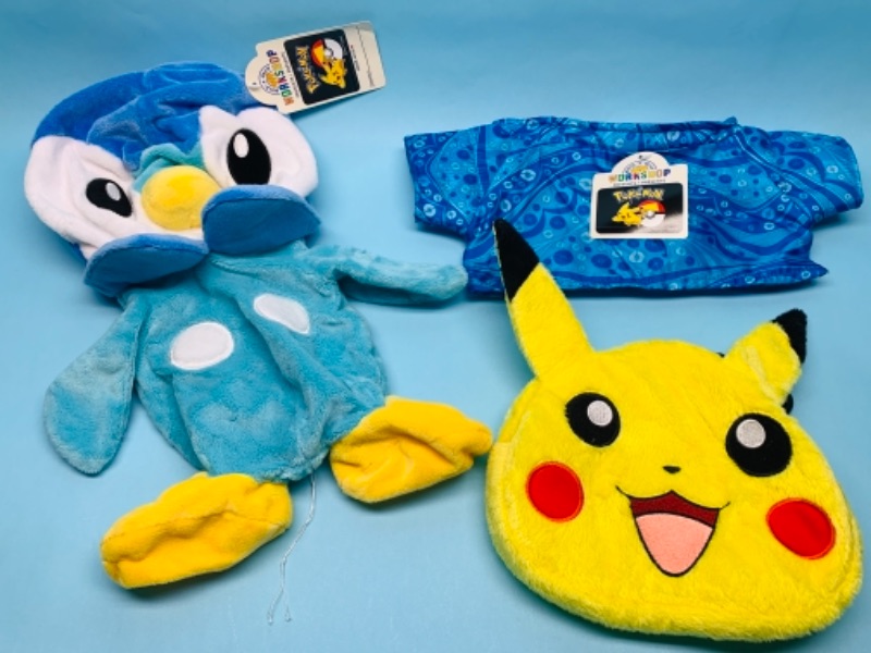 Photo 1 of 766901…unstuffed Pokémon build a bear, outfit, and pikachu bag