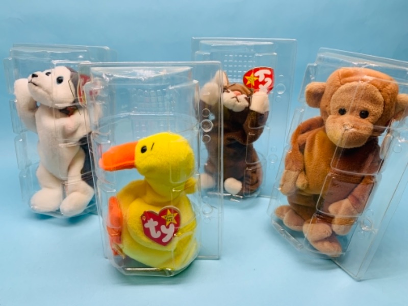 Photo 1 of 766952…beanie babies ty plushies in plastic displays 